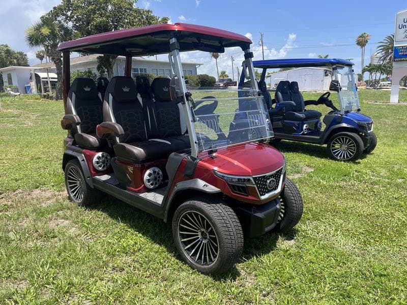 2025 Evolution D-Max GT4 Flamenco Red — 4-Seater with 24-Speaker Sound